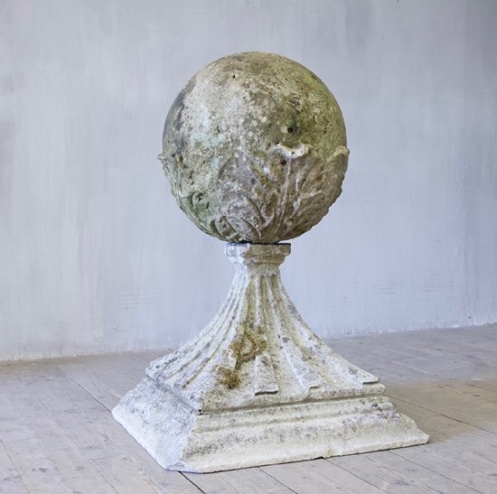 A Georgian carved stone pier ball