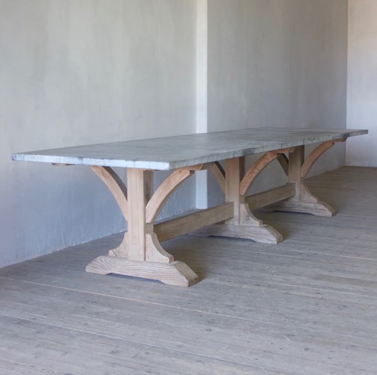 A large and wonderful weathered zinc oak and zinc refectory table