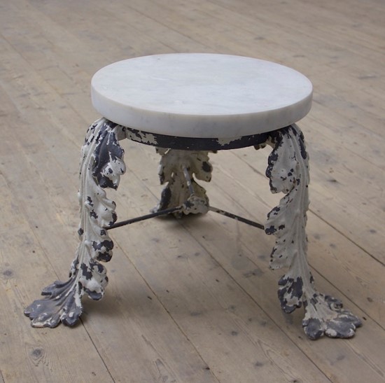 A C19th iron and marble side table