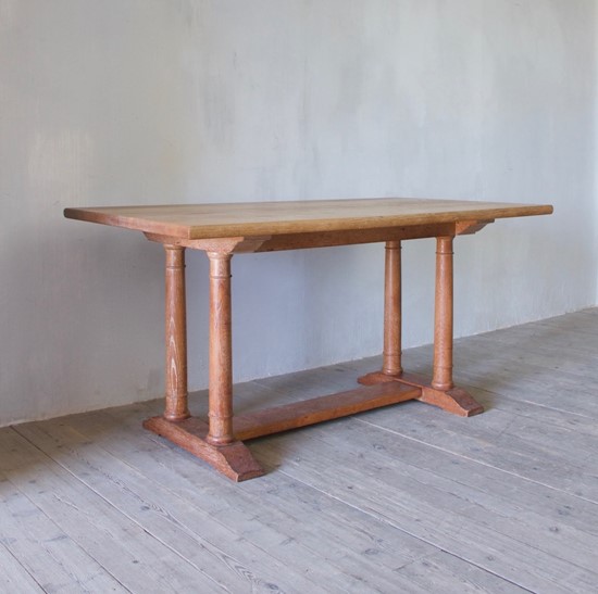A Heal & Sons oak dining table c.1922