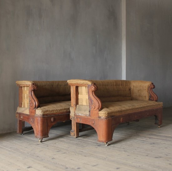 A pair of 19th century sofas from Penrhyn castle, Wales