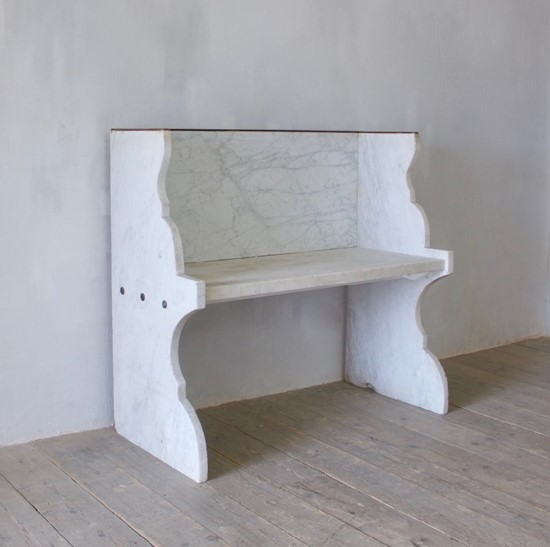 A Carrara marble bench