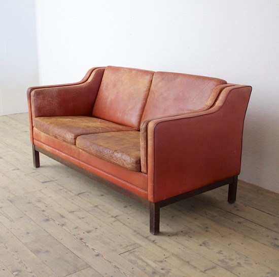 A mid 20th century leather sofa