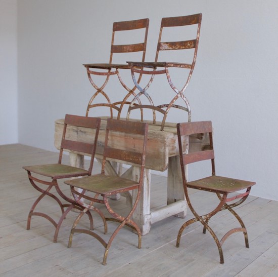 A set of six iron chairs