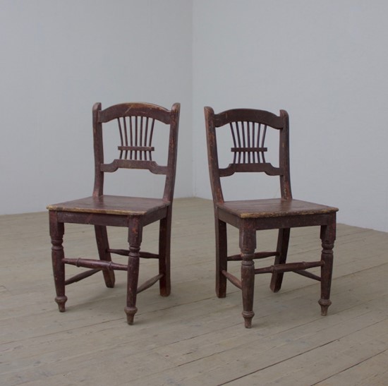A pair of primitive Irish chairs