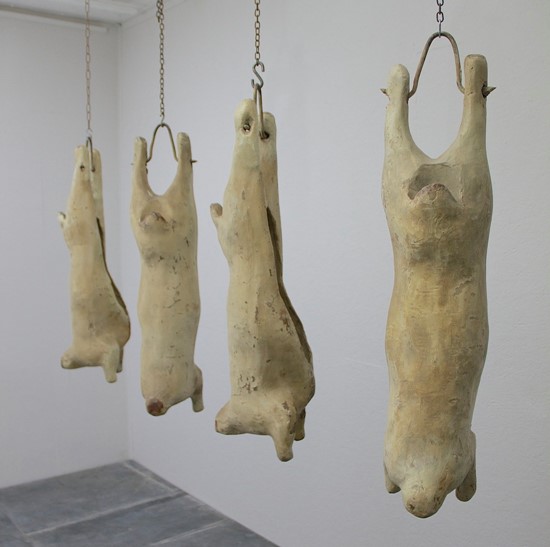 A set of 4 papier-mâché lamb carcasses