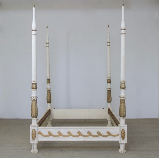 A C18th style four-poster bed
