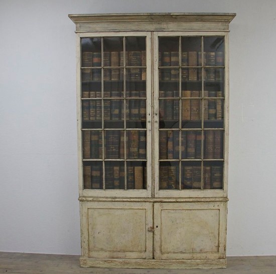 A C19th glazed library bookcase. England c1840