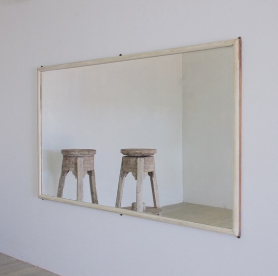 A large Gesso shop mirror, original mirror plate