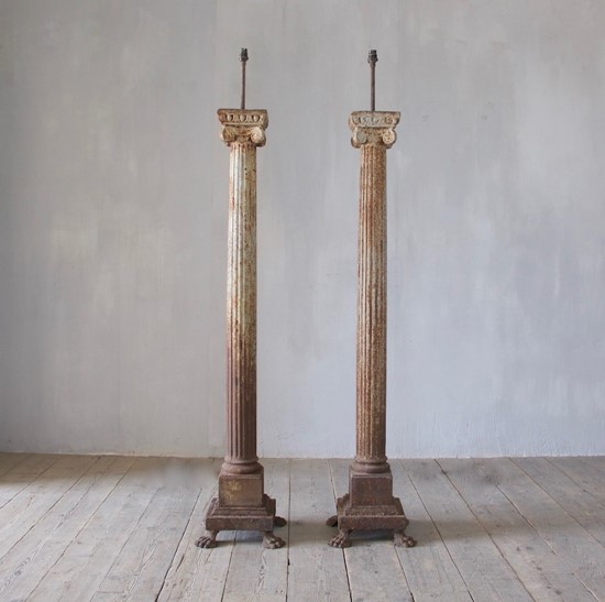 A pair of architectural column lamps