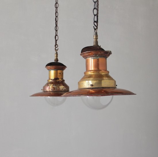 A pair of small copper station lights