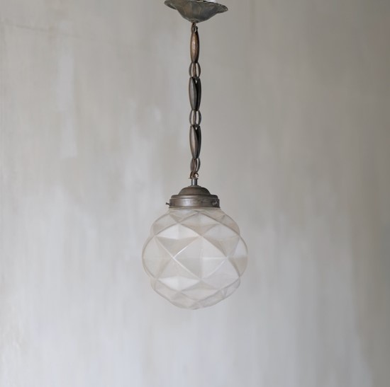 A geometric globe pendant light