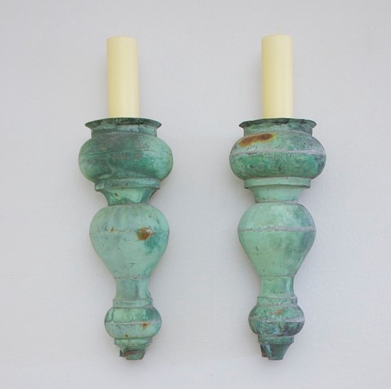 A pair of C19th copper torcheres