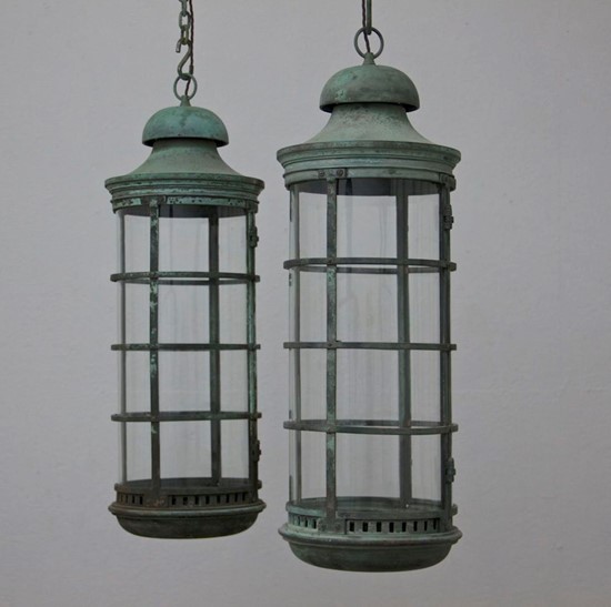 A pair of bronze 1920s lanterns