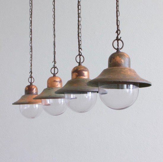 A set of 5 copper pendant lights