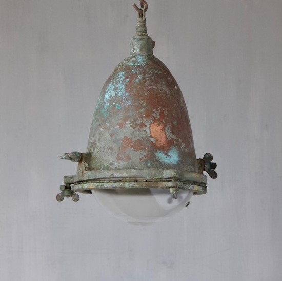 A 1930s copper and brass pendant light