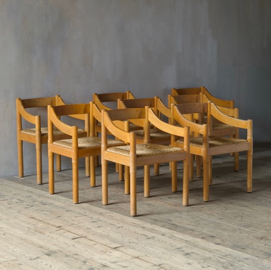 A set of eight Carimate armchairs