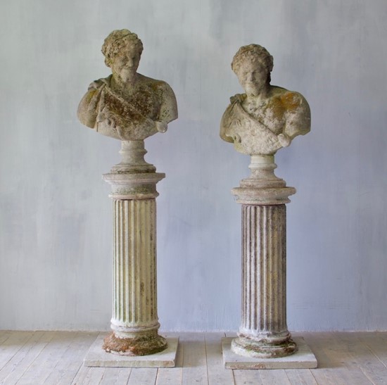 Two classical busts on columns